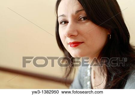 Stock Image - Portrait of caucasian woman. Fotosearch