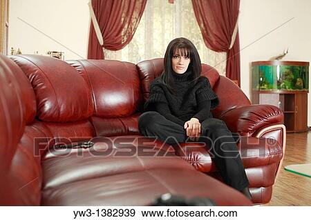 Stock Photo - Portrait of Caucasian women resting in the laiser chair. Fotosearch