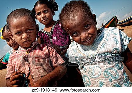 Portrait of children on the beach Puri, Orissa, India View Large Photo Image Stock Photograph - Portrait of children on the beach Puri, Orissa, India. Fotosearch