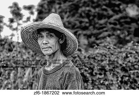 portrait of Chinese famrmer on farm in Guilin China View Large Photo Image Stock Image - portrait of Chinese famrmer on farm in Guilin China. Fotosearch