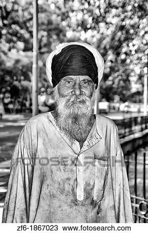 Portrait of colorful Sika Hindu religious man in famous Bangla Shib Gurudwara Sika Great Temple in New Delhi India View Large Photo Image Stock Image - Portrait of colorful Sika Hindu religious man in famous Bangla Shib Gurudwara Sika Great Temple in New Delhi India. Fotosearch