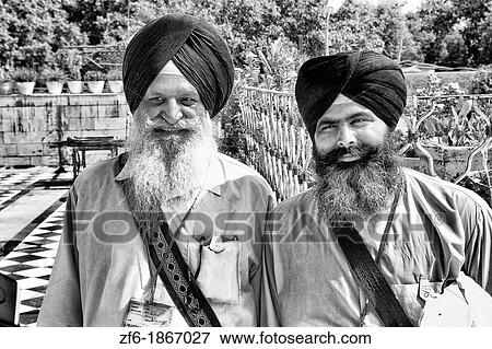 Portrait of colorful Sika Hindu religious man in famous Bangla Shib Gurudwara Sika Great Temple in New Delhi India View Large Photo Image Stock Photo - Portrait of colorful Sika Hindu religious man in famous Bangla Shib Gurudwara Sika Great Temple in New Delhi India. Fotosearch