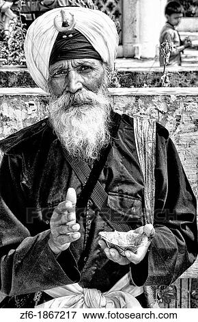 Portrait of colorful Sika Hindu religious man in famous Bangla Shib Gurudwara Sika Great Temple in New Delhi India View Large Photo Image Stock Photo - Portrait of colorful Sika Hindu religious man in famous Bangla Shib Gurudwara Sika Great Temple in New Delhi India. Fotosearch