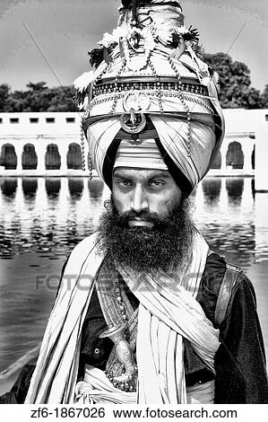 Portrait of colorful Sika Hindu religious man in famous Bangla Shib Gurudwara Sika Great Temple in New Delhi India View Large Photo Image Stock Photograph - Portrait of colorful Sika Hindu religious man in famous Bangla Shib Gurudwara Sika Great Temple in New Delhi India. Fotosearch
