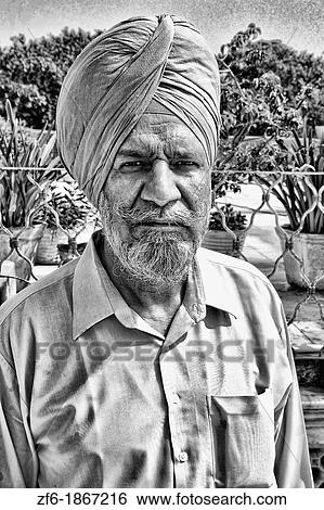 Portrait of colorful Sika Hindu religious man in famous Bangla Shib Gurudwara Sika Great Temple in New Delhi India View Large Photo Image Stock Photograph - Portrait of colorful Sika Hindu religious man in famous Bangla Shib Gurudwara Sika Great Temple in New Delhi India. Fotosearch