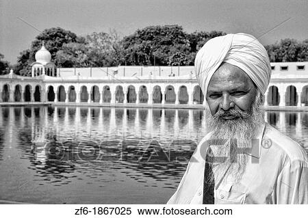 Portrait of colorful Sika Hindu religious man in famous Bangla Shib Gurudwara Sika Great Temple in New Delhi India View Large Photo Image Stock Photography - Portrait of colorful Sika Hindu religious man in famous Bangla Shib Gurudwara Sika Great Temple in New Delhi India. Fotosearch