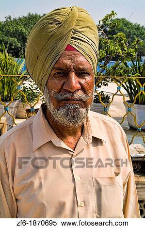 Portrait of colorful Sika Hindu religious man in famous Bangla Shib Gurudwara Sika Great Temple in New Delhi India View Large Photo Image Stock Photography - Portrait of colorful Sika Hindu religious man in famous Bangla Shib Gurudwara Sika Great Temple in New Delhi India. Fotosearch