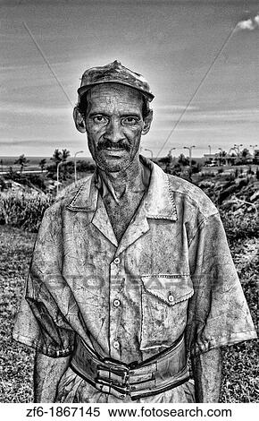 Portrait of common garden worker in city of Havana Cuba dressed in yellow View Large Photo Image Stock Photography - Portrait of common garden worker in city of Havana Cuba dressed in yellow. Fotosearch
