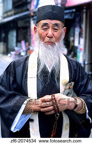 Picture - Portrait of Elderly Priest in Kyoto Japan.. Fotosearch