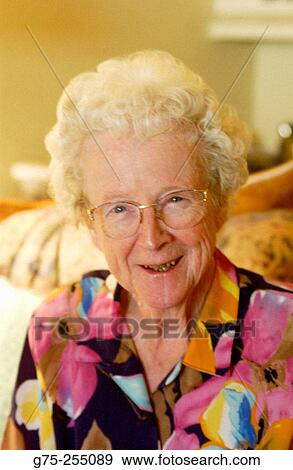Stock Photo - Portrait of Elderly Woman Smiling. Fotosearch