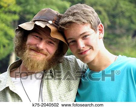 Portrait of father and teenage son outdoors View Large Photo Image Stock Image - Portrait of father and teenage son outdoors. Fotosearch