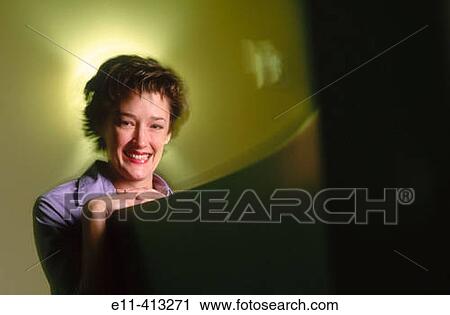 Portrait of female office worker with laptop View Large Photo Image Stock Image - Portrait of female office worker with laptop. Fotosearch