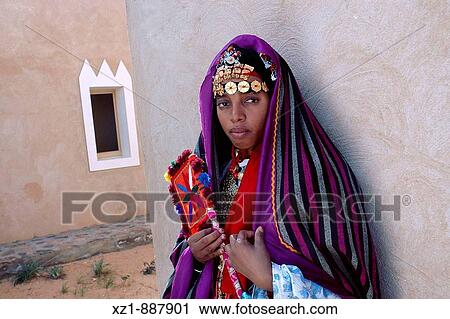 Portrait of girl wearing traditional dress, Ghadamis, Libya View Large Photo Image Stock Image - Portrait of girl wearing traditional dress, Ghadamis, Libya. Fotosearch