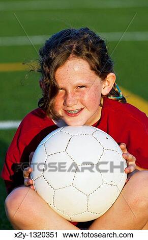 Portrait of girl with soccer ball View Large Photo Image Stock Image - Portrait of girl with soccer ball. Fotosearch