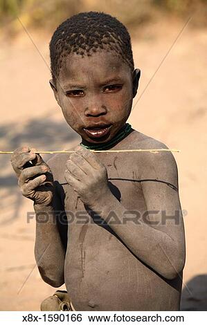 Portrait of Hadza boy, ethnic group living in the Lake Eyasi area, Tanzania View Large Photo Image Stock Photograph - Portrait of Hadza boy, ethnic group living in the Lake Eyasi area, Tanzania. Fotosearch