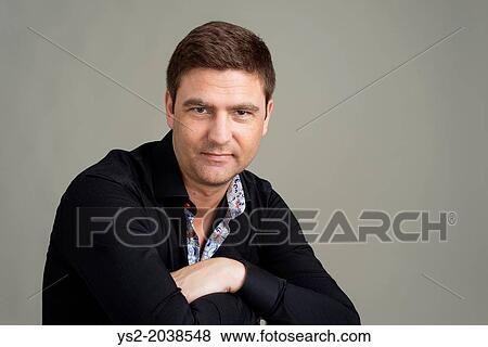 Portrait of handsome man showing determination and confidence. View Large Photo Image Stock Photo - Portrait of handsome man showing determination and confidence.. Fotosearch