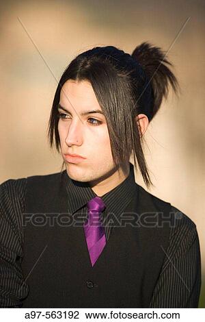 Portrait of handsome teen boy with unusual hair style. View Large Photo Image Stock Image - Portrait of handsome teen boy with unusual hair style.. Fotosearch