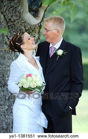 Portrait of happy couple during their marriage, France View Large Photo Image Stock Image - Portrait of happy couple during their marriage, France. Fotosearch