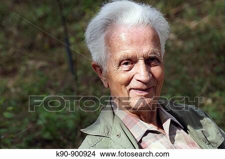 Portrait of happy elderly caucasian man smiling and looking into the camera, Island of Amrum, Northfrisian, Schleswig_Holstein, Northern Germany, Europe View Large Photo Image Picture - Portrait of happy elderly caucasian man smiling and looking into the camera, Island of Amrum, Northfrisian, Schleswig_Holstein, Northern Germany, Europe. Fotosearch