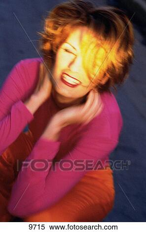 Portrait of happy woman in movement View Large Photo Image Stock Photography - Portrait of happy woman in movement. Fotosearch