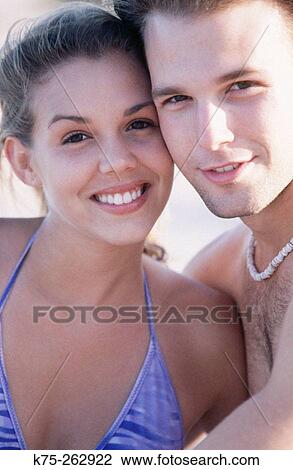 Portrait of happy young couple View Large Photo Image Stock Image - Portrait of happy young couple. Fotosearch