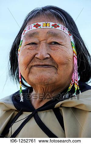 Stock Image - Portrait of Inuit chaman woman, Pond Inlet, Baffin Island, Nunavut, Canada. Fotosearch