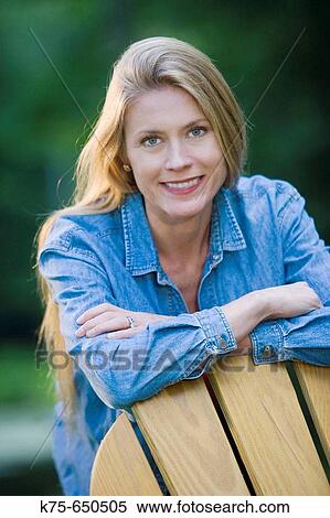 portrait of long haired woman outdoors View Large Photo Image Stock Photography - portrait of long haired woman outdoors. Fotosearch
