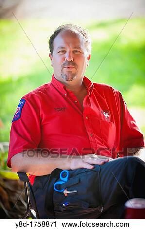 Portrait of male EMT, emergency medical technician, 46 years old, in his uniform, Leakey, Texas, USA View Large Photo Image Stock Image - Portrait of male EMT, emergency medical technician, 46 years old, in his uniform, Leakey, Texas, USA. Fotosearch