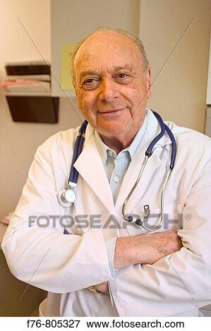 Portrait of male physician with stethoscope View Large Photo Image Stock Photo - Portrait of male physician with stethoscope. Fotosearch