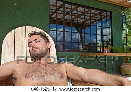 Stock Photo - Portrait of man in the mountains. Fotosearch