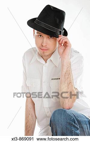 portrait of man wearing a hat View Large Photo Image Stock Image - portrait of man wearing a hat. Fotosearch