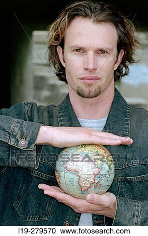 portrait of man with globe View Large Photo Image Stock Image - portrait of man with globe. Fotosearch