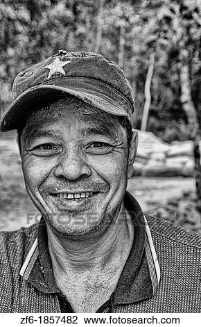 Portrait of man with hat in Siem Reap Cambodia Asia View Large Photo Image Stock Image - Portrait of man with hat in Siem Reap Cambodia Asia. Fotosearch