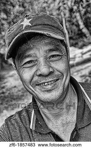 Portrait of man with hat in Siem Reap Cambodia Asia View Large Photo Image Stock Image - Portrait of man with hat in Siem Reap Cambodia Asia. Fotosearch