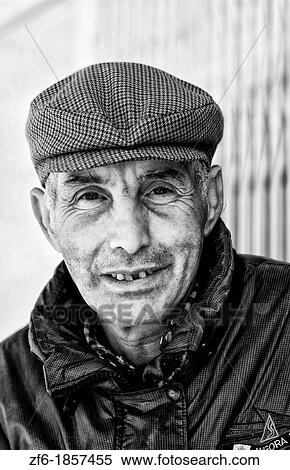 Stock Photography - Portrait of man with hat in Tunis Tunisia in Northern Africa. Fotosearch