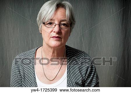 Portrait of middle aged woman with glasses View Large Photo Image Stock Photo - Portrait of middle aged woman with glasses. Fotosearch