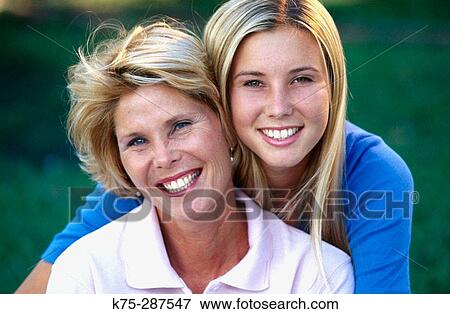 Portrait of mom and daughter View Large Photo Image Stock Photo - Portrait of mom and daughter. Fotosearch