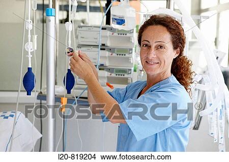 Portrait of nurse, Resuscitation unit. Hospital Universitario de Gran Canaria Doctor Negrin, Las Palmas de Gran Canaria. Canary Islands, Spain View Large Photo Image Picture - Portrait of nurse, Resuscitation unit. Hospital Universitario de Gran Canaria Doctor Negrin, Las Palmas de Gran Canaria. Canary Islands, Spain. Fotosearch