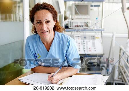 Stock Image - Portrait of nurse, Resuscitation unit. Hospital Universitario de Gran Canaria Doctor Negrin, Las Palmas de Gran Canaria. Canary Islands, Spain. Fotosearch
