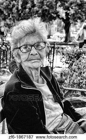 Portrait of old proud woman in park in Havana Habana Cuba View Large Photo Image Stock Photo - Portrait of old proud woman in park in Havana Habana Cuba. Fotosearch