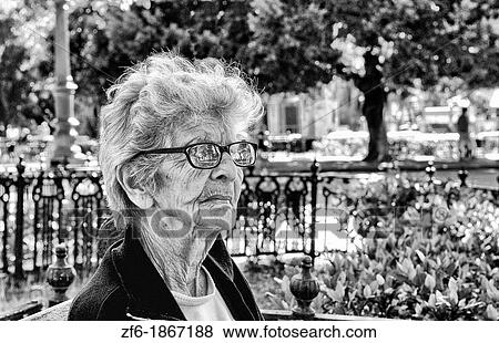 Portrait of old proud woman in park in Havana Habana Cuba View Large Photo Image Stock Photo - Portrait of old proud woman in park in Havana Habana Cuba. Fotosearch