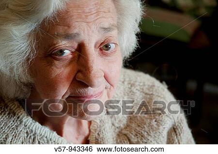 Portrait of old woman looking at the camera. Close view. View Large Photo Image Stock Photograph - Portrait of old woman looking at the camera. Close view.. Fotosearch