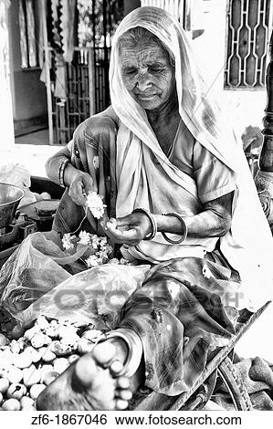Portrait of older woman Hindu vendor in Jaipur Rajasthan India View Large Photo Image Stock Photograph - Portrait of older woman Hindu vendor in Jaipur Rajasthan India. Fotosearch