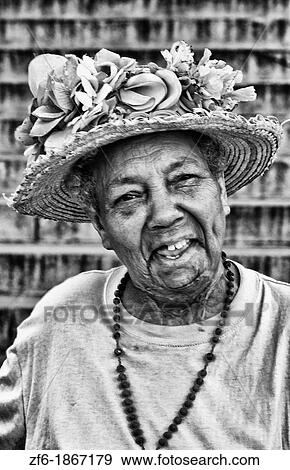 Portrait of older woman smiling in straw hat in Havana Habana Cuba View Large Photo Image Stock Photo - Portrait of older woman smiling in straw hat in Havana Habana Cuba. Fotosearch