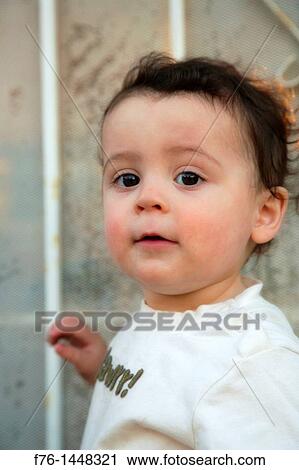 Portrait of one year old boy with apprehensive look and with blur added via a Lensbaby View Large Photo Image Stock Image - Portrait of one year old boy with apprehensive look and with blur added via a Lensbaby. Fotosearch