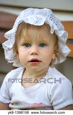 Stock Photograph - Portrait of One Year Old Caucasian Baby Girl. Fotosearch