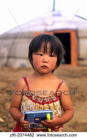 Stock Image - Portrait of Poor Children in Mongolia.. Fotosearch