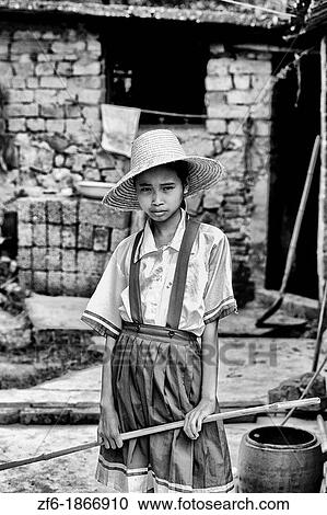 Portrait of poor girl at home in Guilin China View Large Photo Image Stock Image - Portrait of poor girl at home in Guilin China. Fotosearch