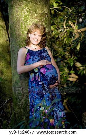 Stock Photo - Portrait of Pregnant Woman in Pisgah National Forest - near Brevard, North Carolina, USA. Fotosearch