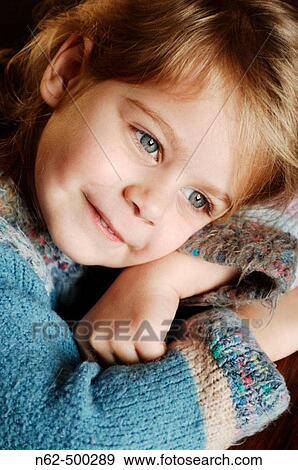 Stock Photo - Portrait of pretty blonde girl. Fotosearch